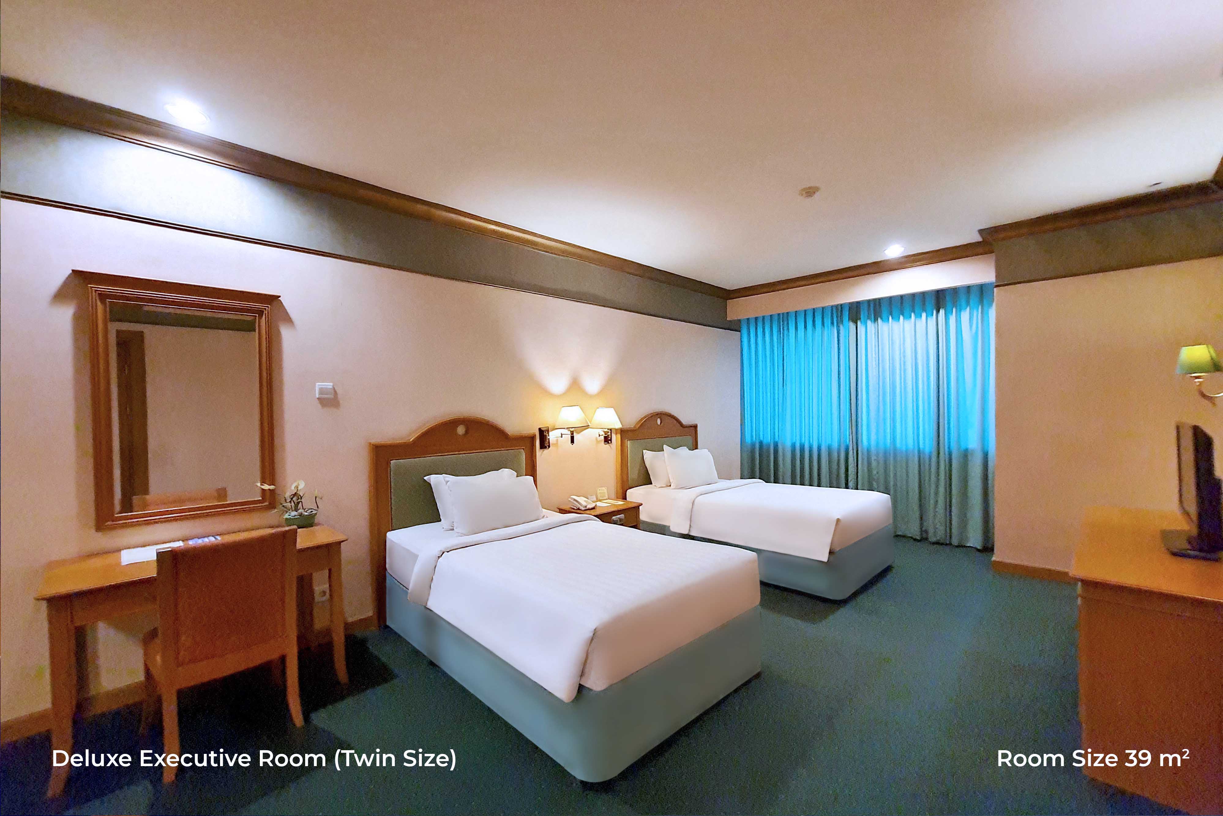Deluxe Executive Twin Bed by tunjunganhotel.com