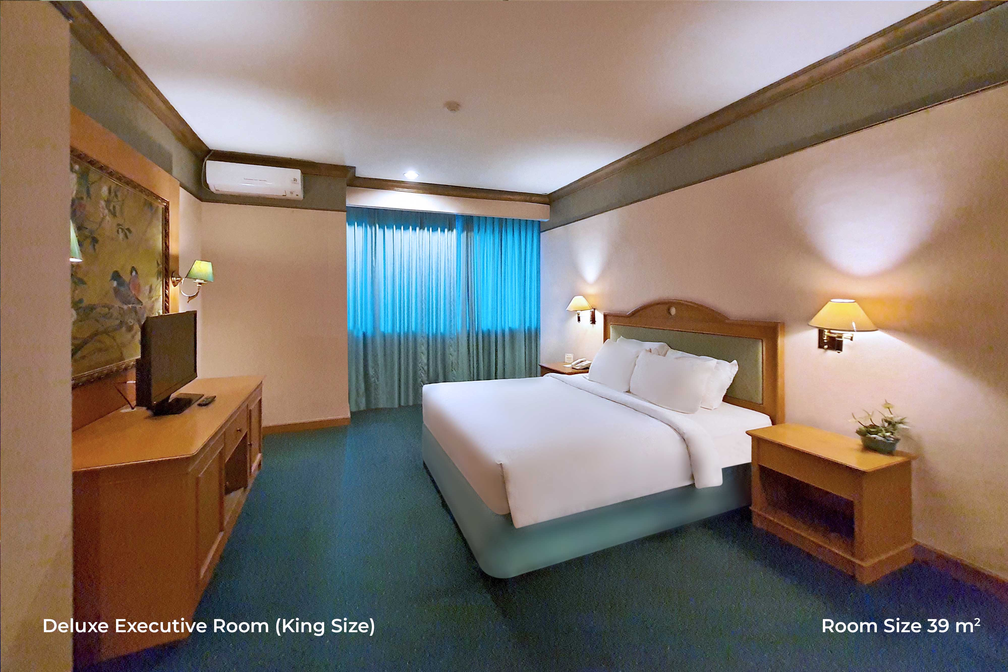 Deluxe Executive King Size by tunjunganhotel.com